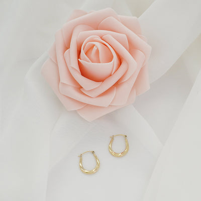 Solid Gold Twist Design Oval Shape Hoop Earrings