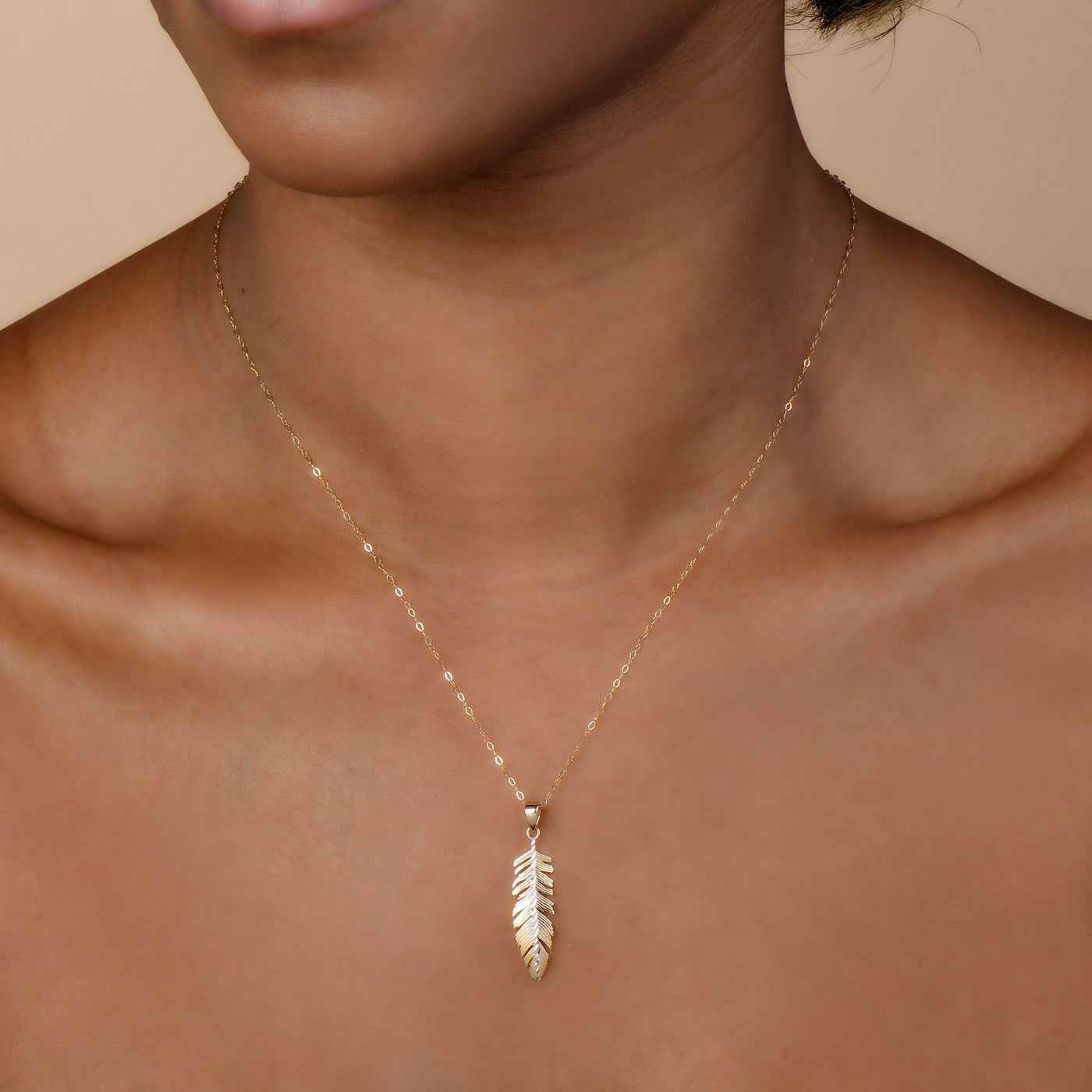 14K GOLD TWO-TONED FEATHER PENDANT