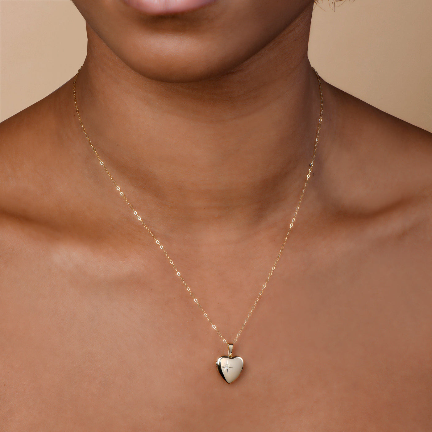 14K GOLD STARBURST HEART LOCKET